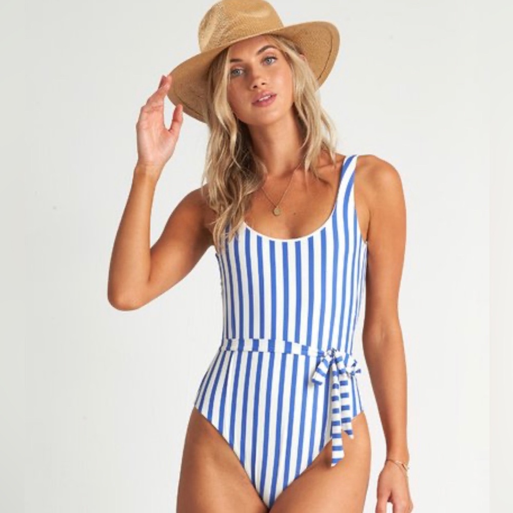 In the blue one piece Swim